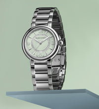 Laden Sie das Bild in den Galerie-Viewer, Maurice Lacroix Fiaba Colours Edition Diamonds FA1104-SS002-G20-1 | Damenuhr Ø 32 mm | Grünes Zifferblatt | 46 Diamanten | Swiss Made | NEU OVP | 2 Jahre Herstellergarantie